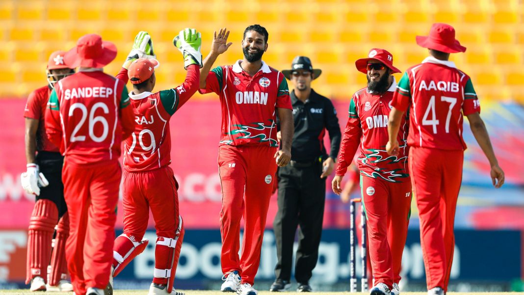 Group B Oman celebrate