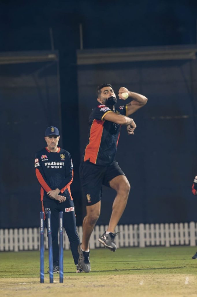 UAE - Ahmed Raza mid-delivery stride during an RCB net session (Photo: RCB Tweets)