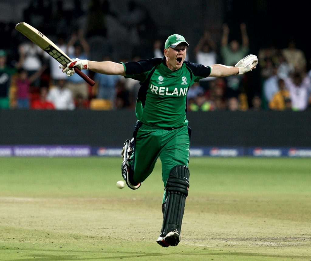 Kevin O'Brien celebrates the fastest ever World Cup hundred.