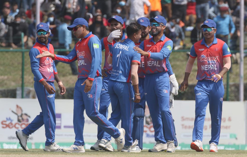The Nepal team celebrate a wicket