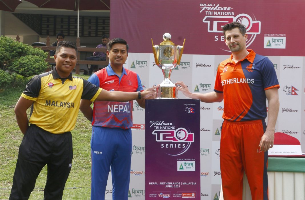 Nepal Malaysia Netherlands captains with tri series trophy