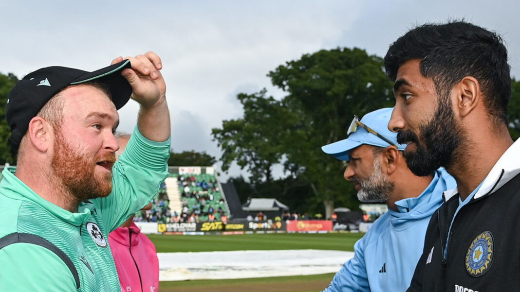 Paul Stirling of Ireland Shakes hands with Jasprit Bumrah of India